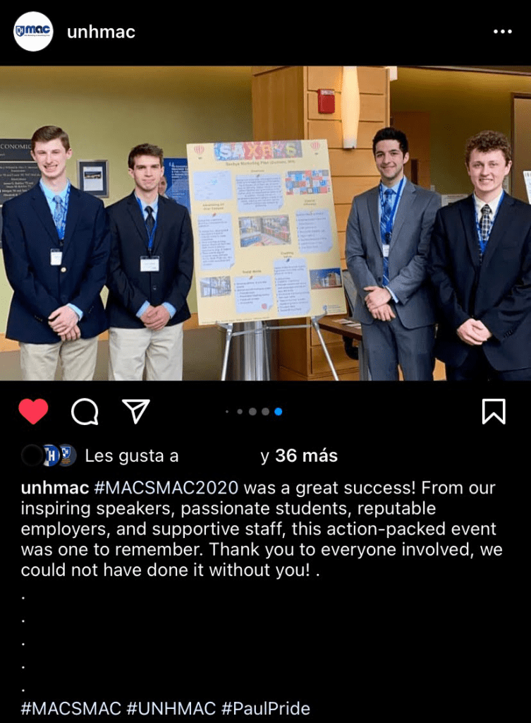 Instagram post of the team next to our marketing plan poster